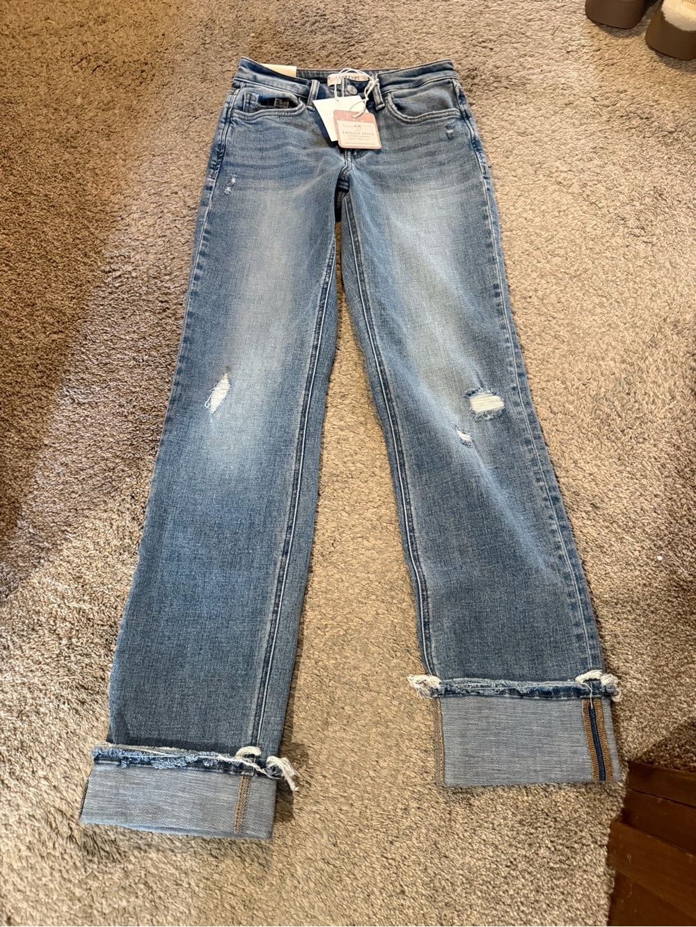 Women’s Light Blue Distressed Wide-Leg Jeans with Frayed Cuff